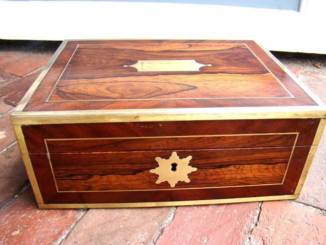 A fine Gentleman's brass bound rosewood travelling box circa 1815 with its' original fitted interior